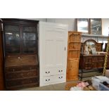 A white painted pine wardrobe fitted two drawers b