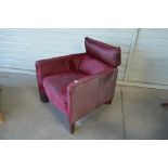 A hide upholstered armchair