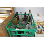 A quantity of vintage glass bottles