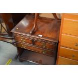 A reproduction chest, fitted brushing slide