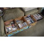 Four boxes of various CD's and DVD's