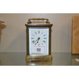 A glass cased carriage clock