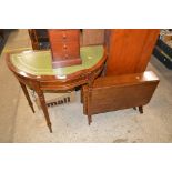 A reproduction mahogany demi-lune hall table with