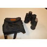 A pair of Halina 10 x 50 binoculars with carrying