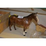 A Beswick brown glazed horse