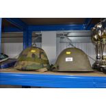 Two military helmets