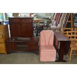 A reproduction mahogany drop leaf table; a dining