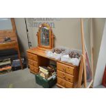A modern pine dressing table, fitted six drawers a
