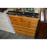 A modern pine chest fitted two short over four lon