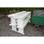 Four white painted benches