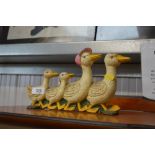 A door stop in the form of ducks