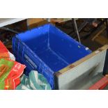 Three plastic storage crates