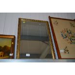 An bevel edged gilt framed mirror