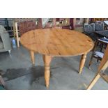 A pine circular top table