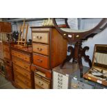 A pair of J E Coyle bedside chests fitted three dr