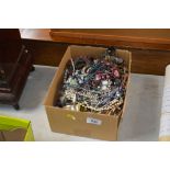 A box of various costume jewellery