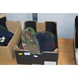 A box containing berets and side caps
