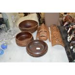 A quantity of wooden items to include turned bowls