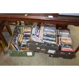 Three boxes of various DVD's