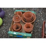 A quantity of terracotta planters