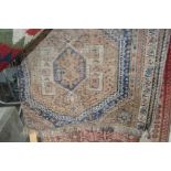 An approx. 4ft x 3ft floral patterned wool rug, AF