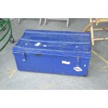 A blue painted metal trunk