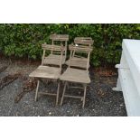 Four folding chairs