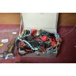 A jewellery box and contents of various costume je