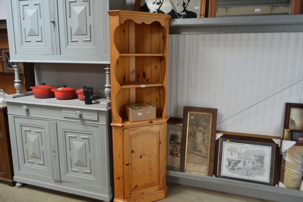 A pine corner cupboard