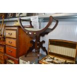 An Edwardian revolving piano stool