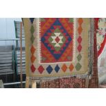 An approx. 4ft 2ins x 2ft 7ins Kelim rug