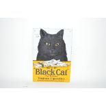 An enamel advertising sign for "Black Cat Cigarett