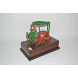 An old model of a horizontal beam engine, on mahog
