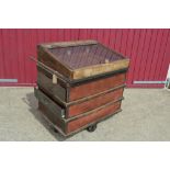 A converted Vintage linen cart, with hinged glass