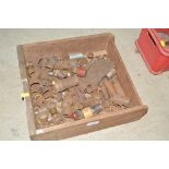 A tray box of various metal collars, mounts and od