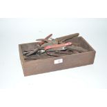 A wooden box and contents of Vintage secateurs