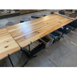 A pine trestle table with period cast iron support