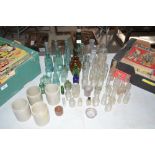 A collection of various glass medicine bottles etc