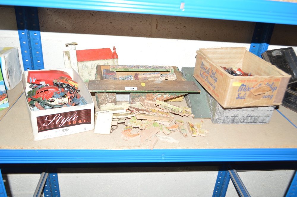 A collection of die cast model soldiers and other