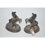 A pair of Spelter Marley horse and groom figures,
