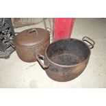 Two old iron cooking pots