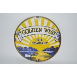 A circular enamel advertising sign for "Golden Wes