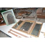 A gilt framed triptych dressing table mirror; and