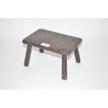 A small Antique rustic stool