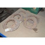 Five cast iron quoits