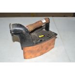 An Antique copper based box iron