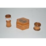 Two 19th Century boxwood dice shakers and a Mauchl