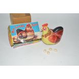 A battery operated Hen Laying Eggs toy