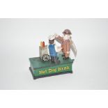 A novelty cast iron moneybox, "Hot Dog Ban