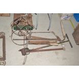 A hay knife, Vintage lawn edger, bow saw etc.